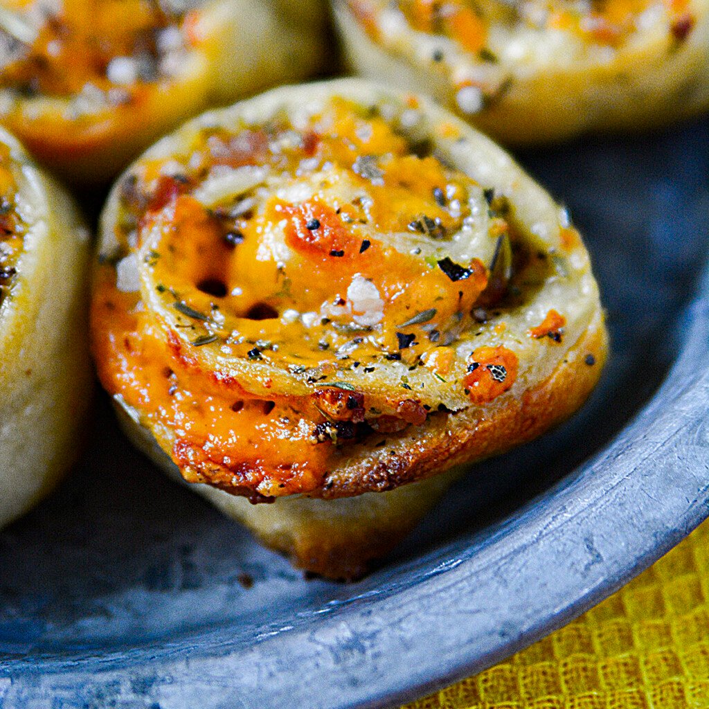 Garlic butter bacon cheddar rolls square image.