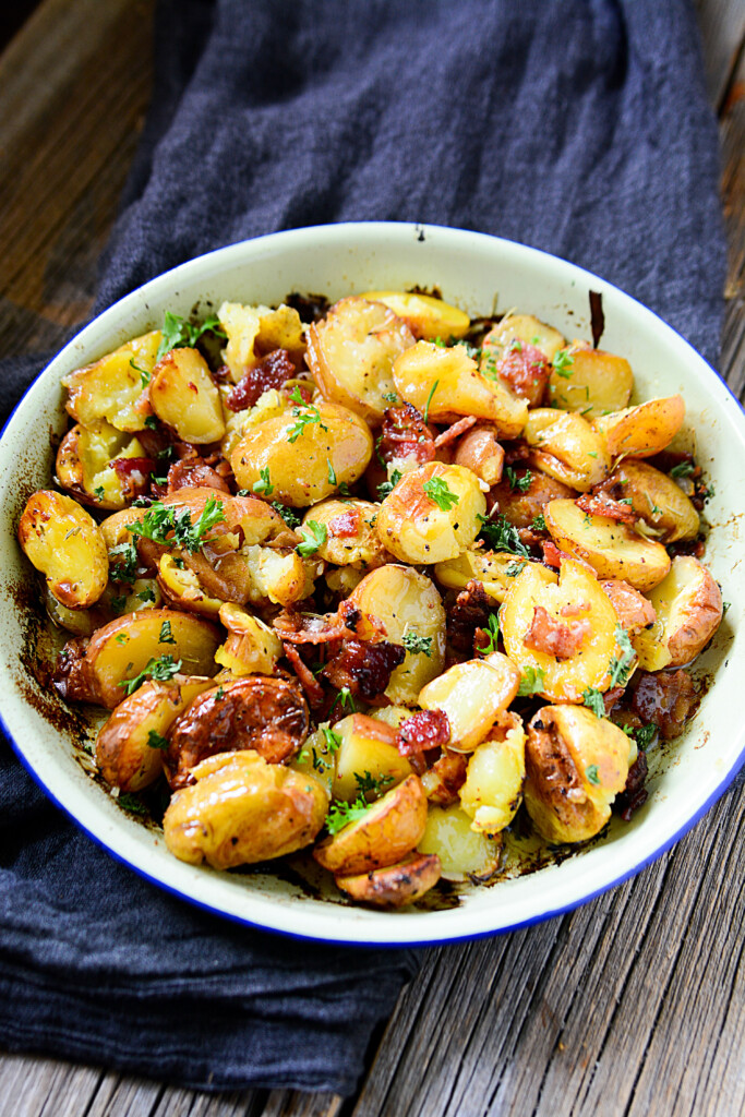 Crispy, buttery, smoky, salty, herb-y - this roasted potato dish with bacon and rosemary is a show stopper
