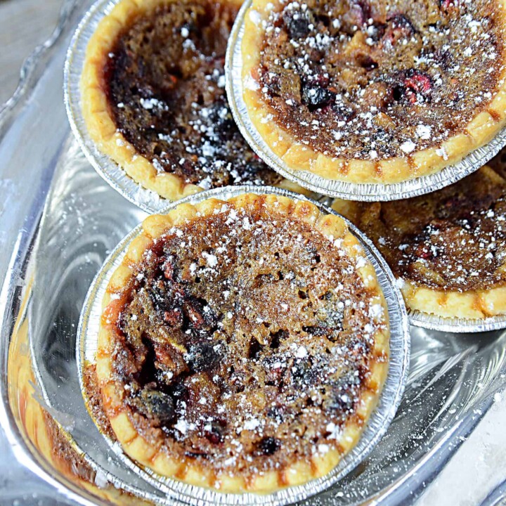 cranberry pear maple butter tarts. A truly magical creation that is sweet, buttery, a tiny bit tart and oh so yummy!