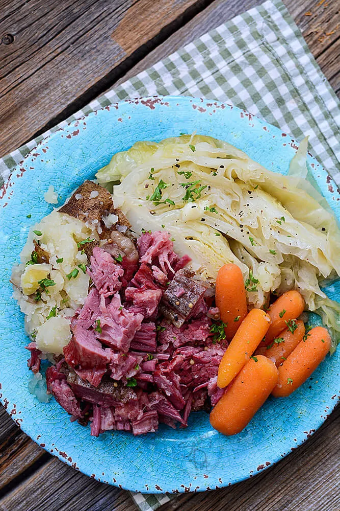 Instant Pot Shredded Corned Beef and Cabbage is a super easy way to cook a beef brisket that is typically really tough. A bonus is that you can also cook it in the slow cooker! It's a great and tasty meal that's ideal for St. Patrick's day or any holiday recipe!