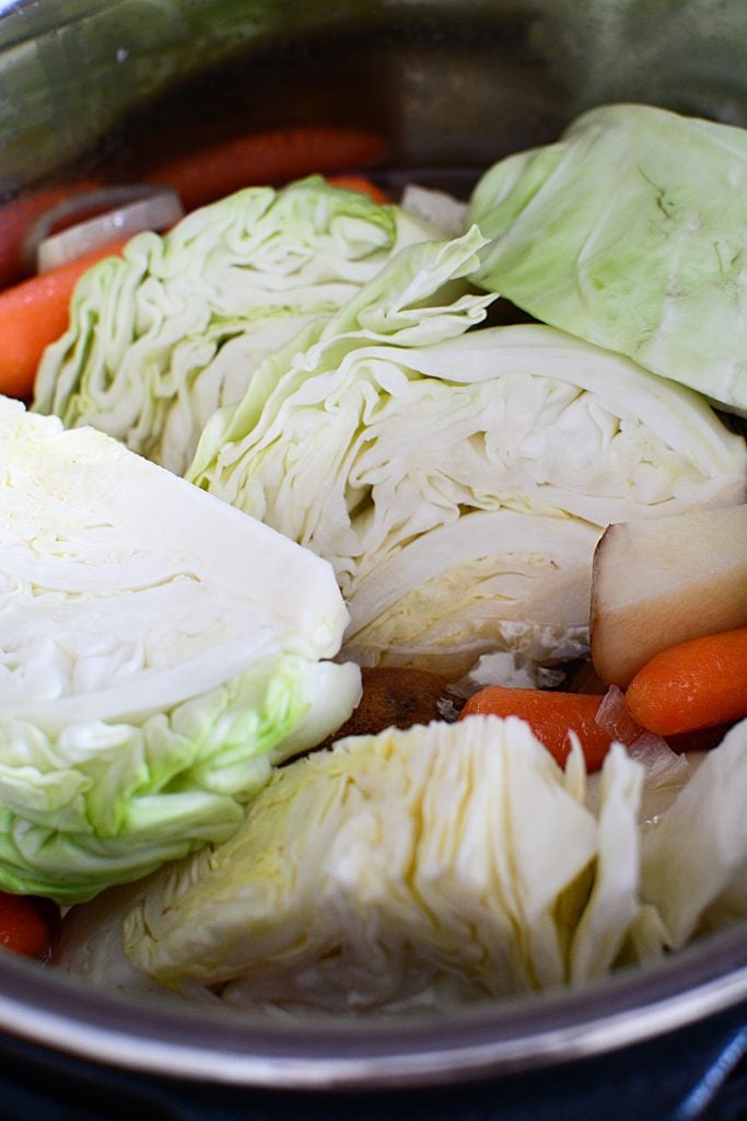 Instant Pot Shredded Corned Beef and Cabbage is a super easy way to cook a beef brisket that is typically really tough. A bonus is that you can also cook it in the slow cooker! It's a great and tasty meal that's ideal for St. Patrick's day or any holiday recipe!