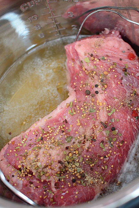 Instant Pot Shredded Corned Beef and Cabbage is a super easy way to cook a beef brisket that is typically really tough. A bonus is that you can also cook it in the slow cooker! It's a great and tasty meal that's ideal for St. Patrick's day or any holiday recipe!