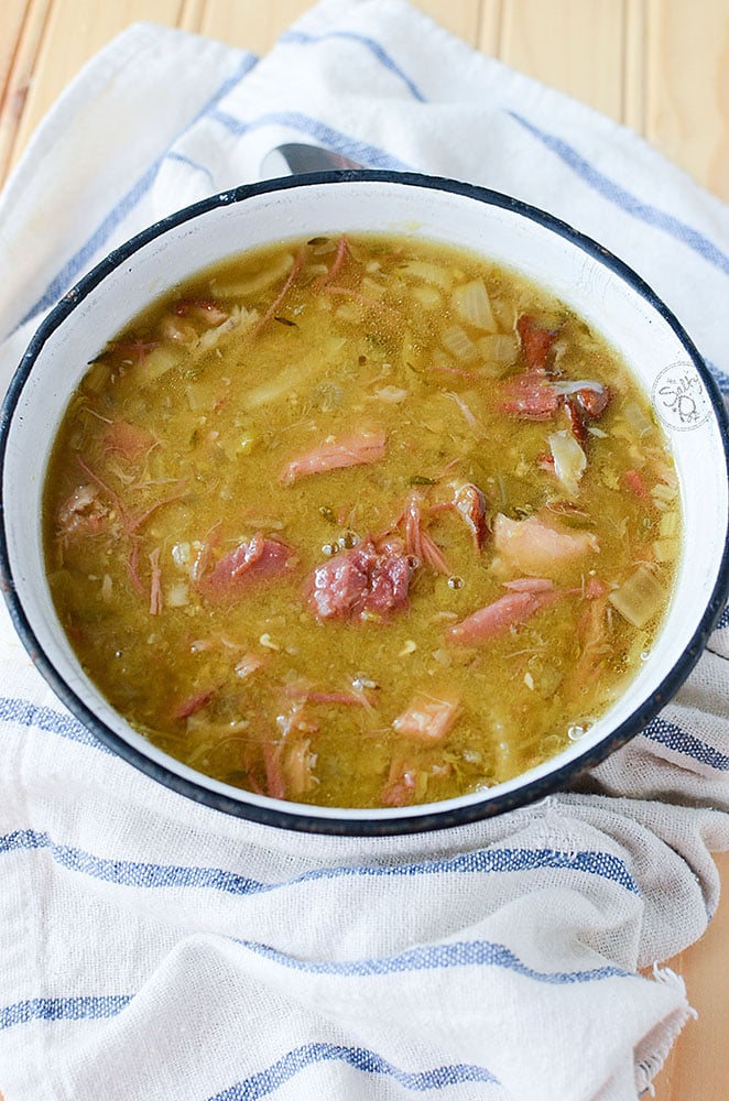 Slow cooker Smoked Pork Hock Soup with Peas. Smoky and hearty, this ham hock soup is filled with amazing flavor that's frugal to make and tasty to eat. Much like your holiday ham and split pea soup, this soup has a smokier pork flavor and texture. This hearty bowl of smoked ham hock soup with peas is ready for eating!