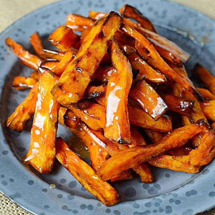 Air fryer honey butter Sweet potato fries on a grey plate.