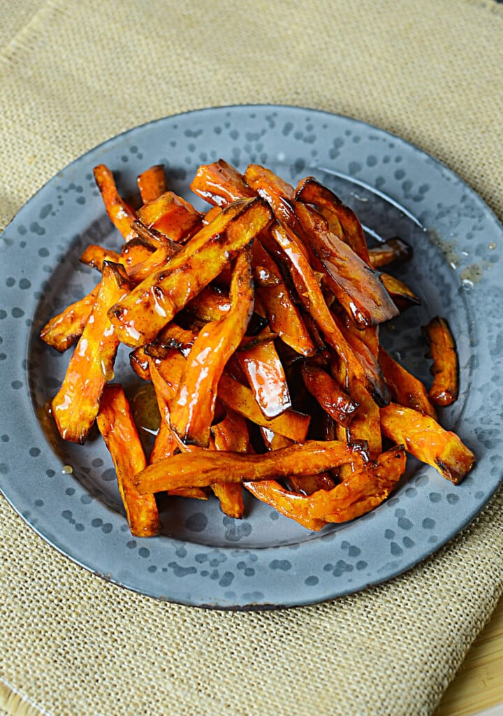 Trying to get your kidlets to eat more veggies??  SOLUTION: Sweet potato fries. Not just ANY sweet potato fries - Honey Butter Cinnamon Sweet Potato Fries!!