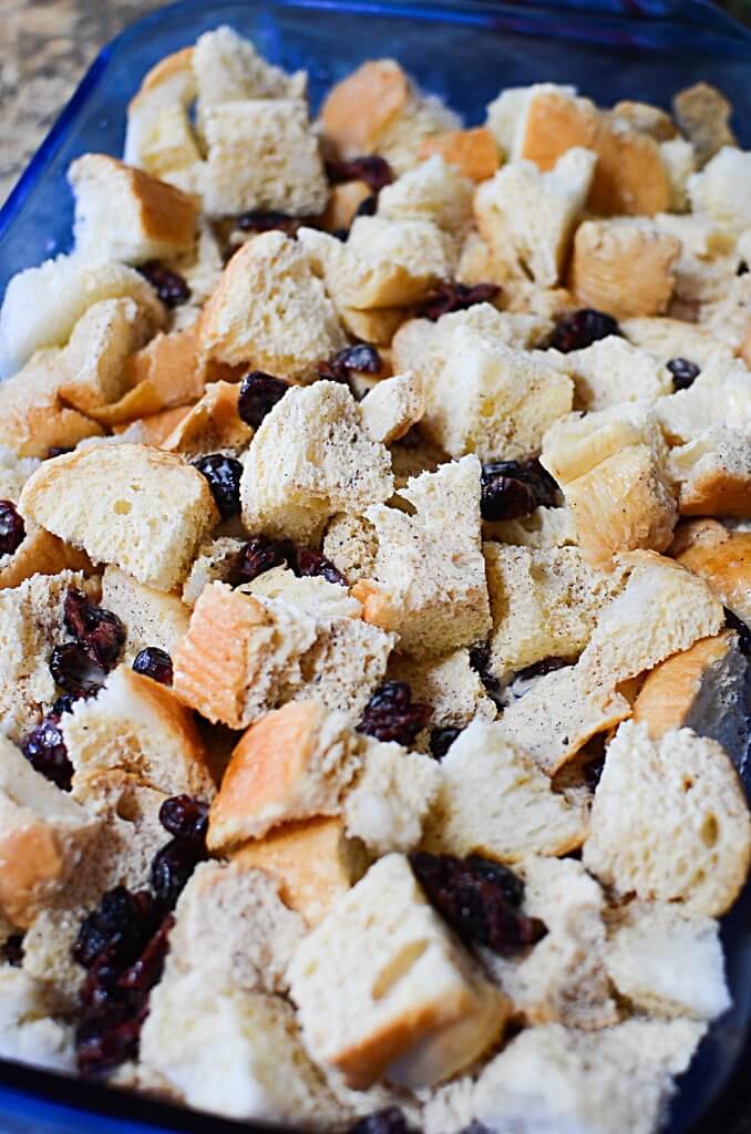 Warm,comforting Eggnog Bread Pudding with Cranberries is a perfect way to start Christmas morning! Best of all, make it the night before & bake in the A.M.! - The Salty Pot