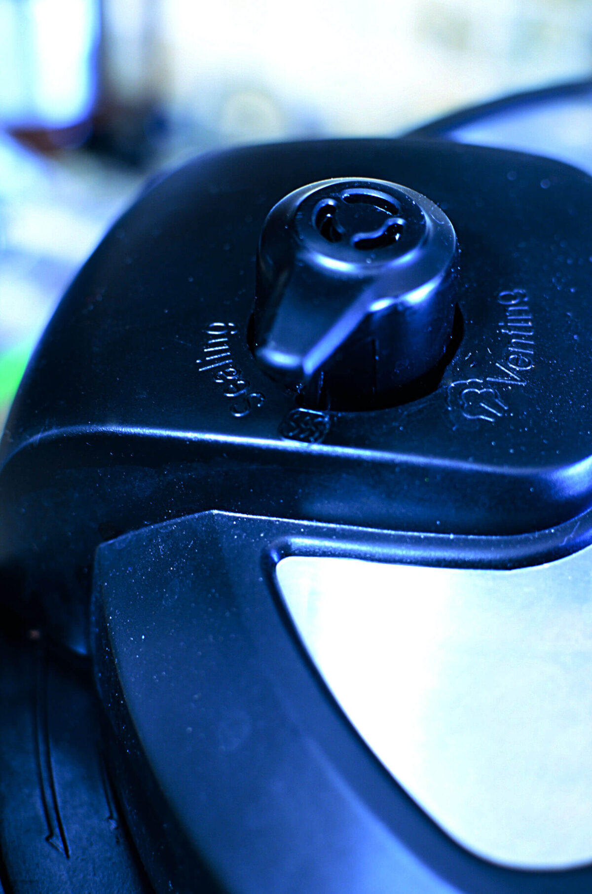 The toggle switch from sealing to venting.