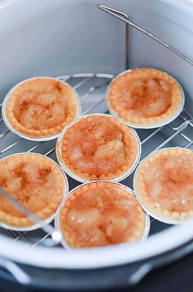 https://thesaltypot.com/wp-content/uploads/2019/03/Foodi-Apple-Tarts07-678x1024.jpg