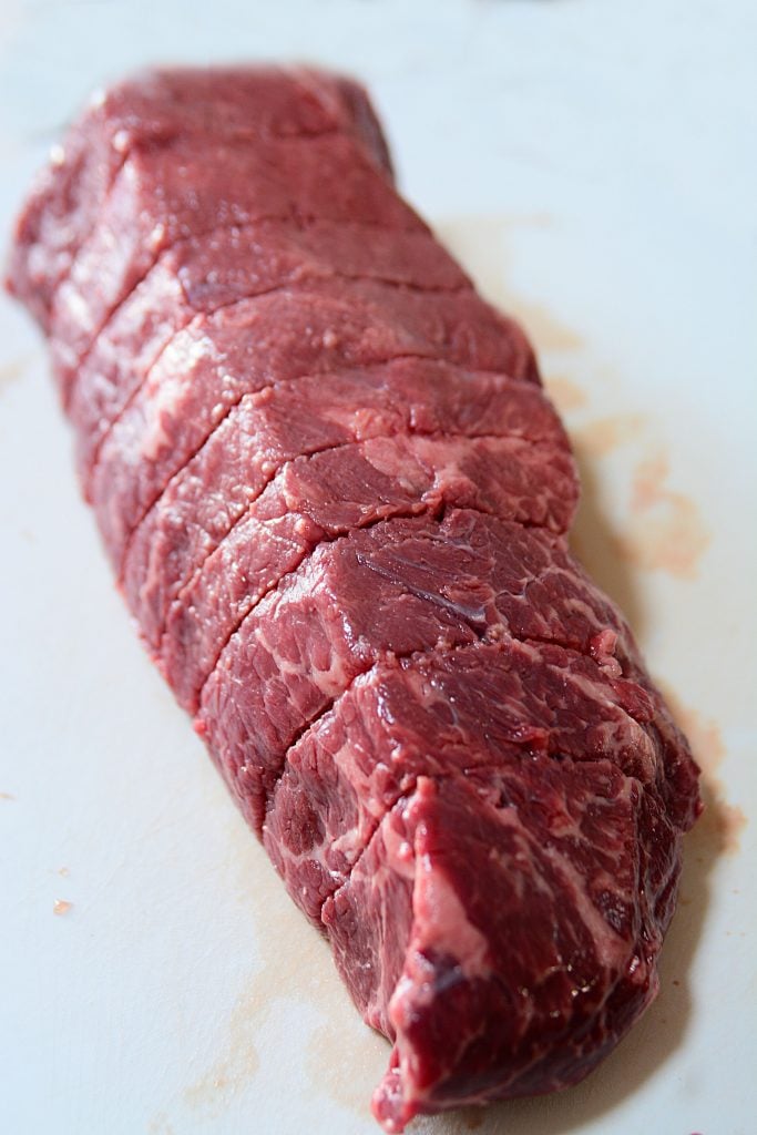 The beef roast ready to go into the instant pot after having the cotton twine removed around the roast.