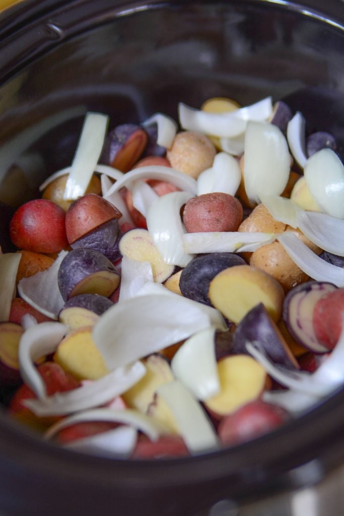 Slow Cooker Sausage Casserole With Green Beans And Potatoes - Potatoes and onions in slow cooker