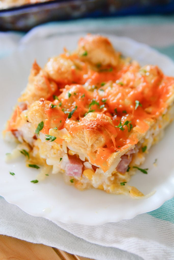 Hashbrowns, ham, corn, eggs, and cheese of course, makes up this amazing ham casserole
