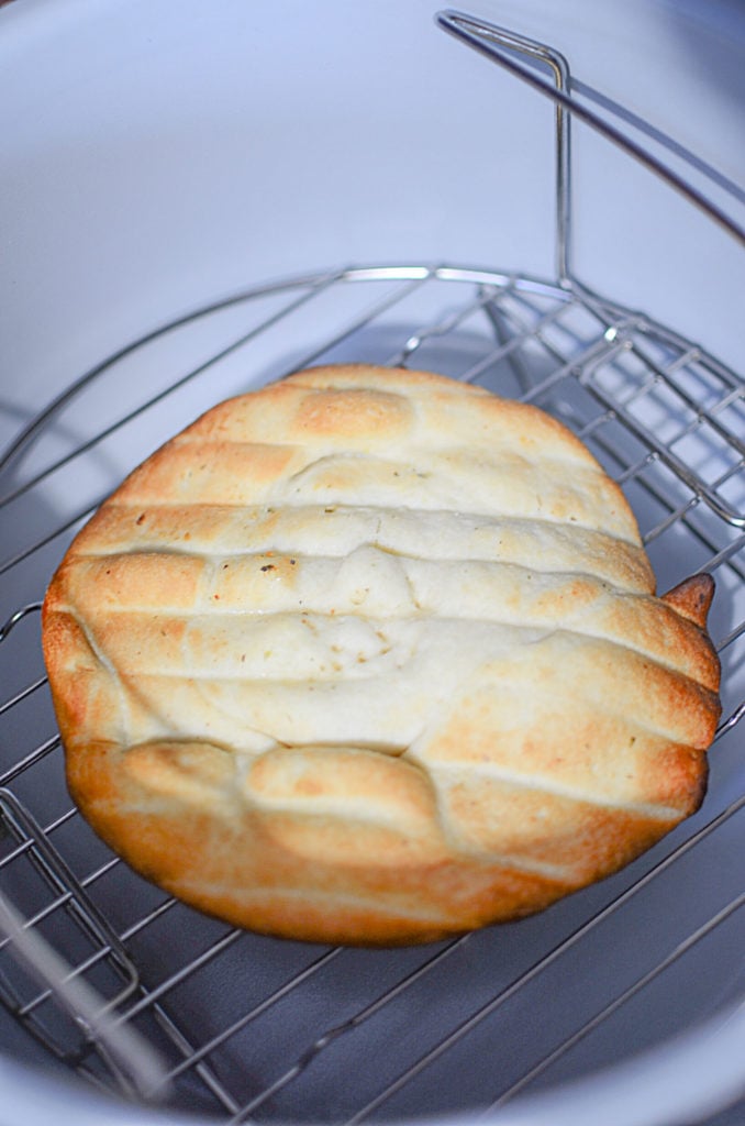 A picture of the flatbread being airfried