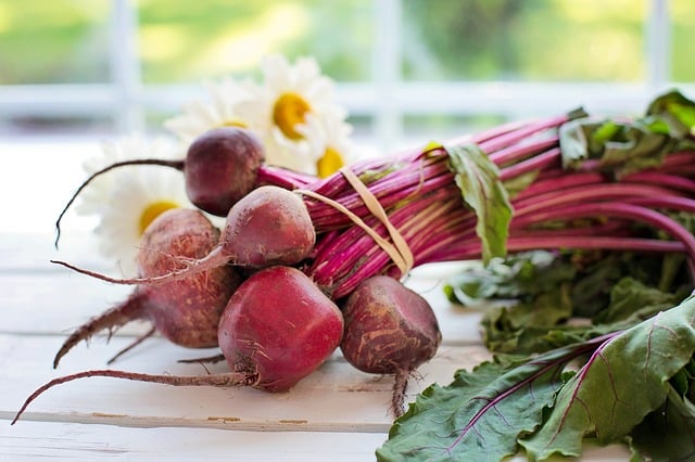 Beets sitting on a table.