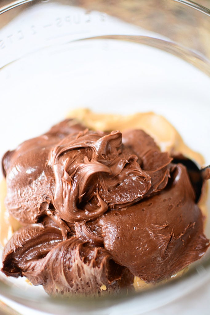 An image of some chocolate frosting in a bowl