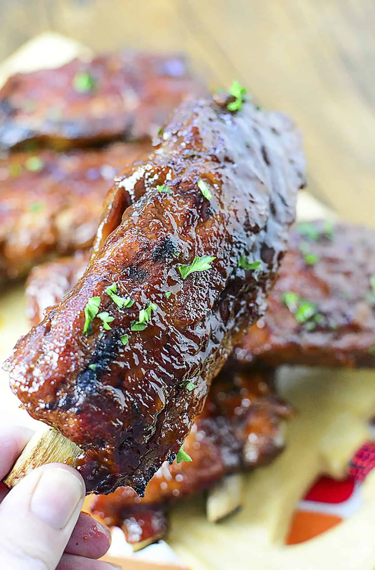 One BBQ photographed close up with others in the background.