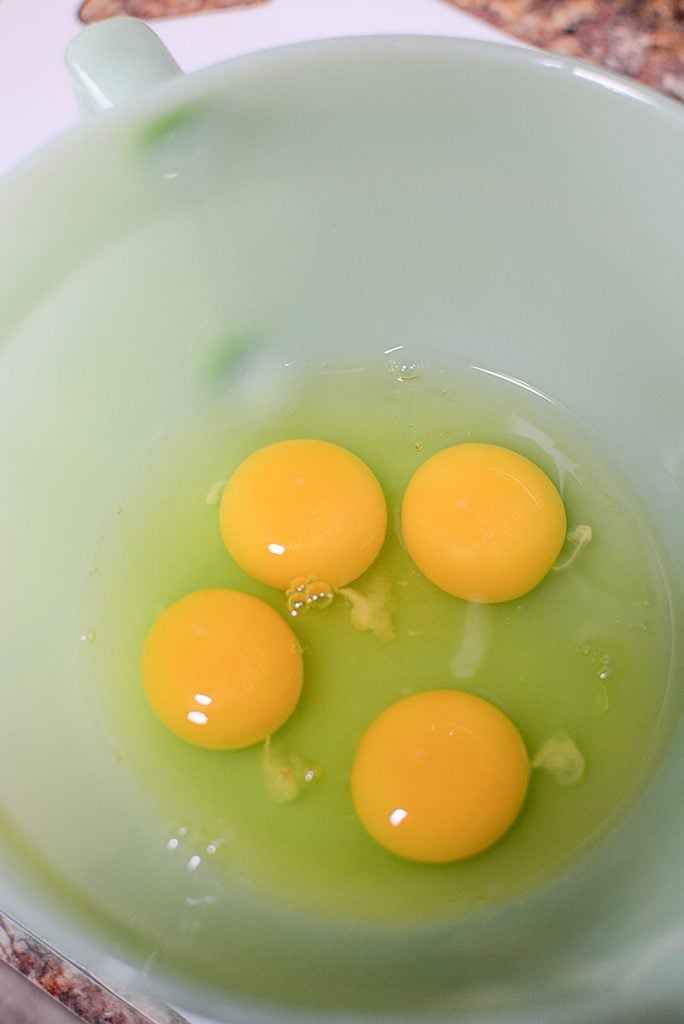 4 whole eggs cracked in my grandmothers vintage mixing bowl!