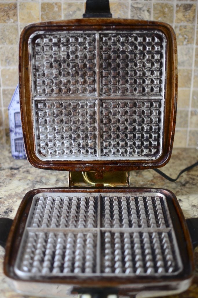 A photo of the inside of the Vintage Sunbeam Waffle Iron of my mom's. 