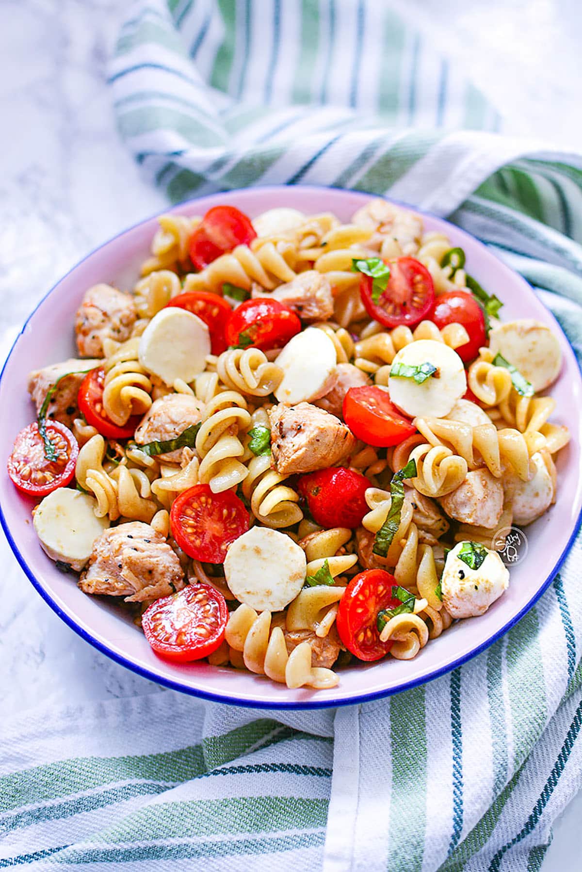 Caprese salad in an enamel bowl.