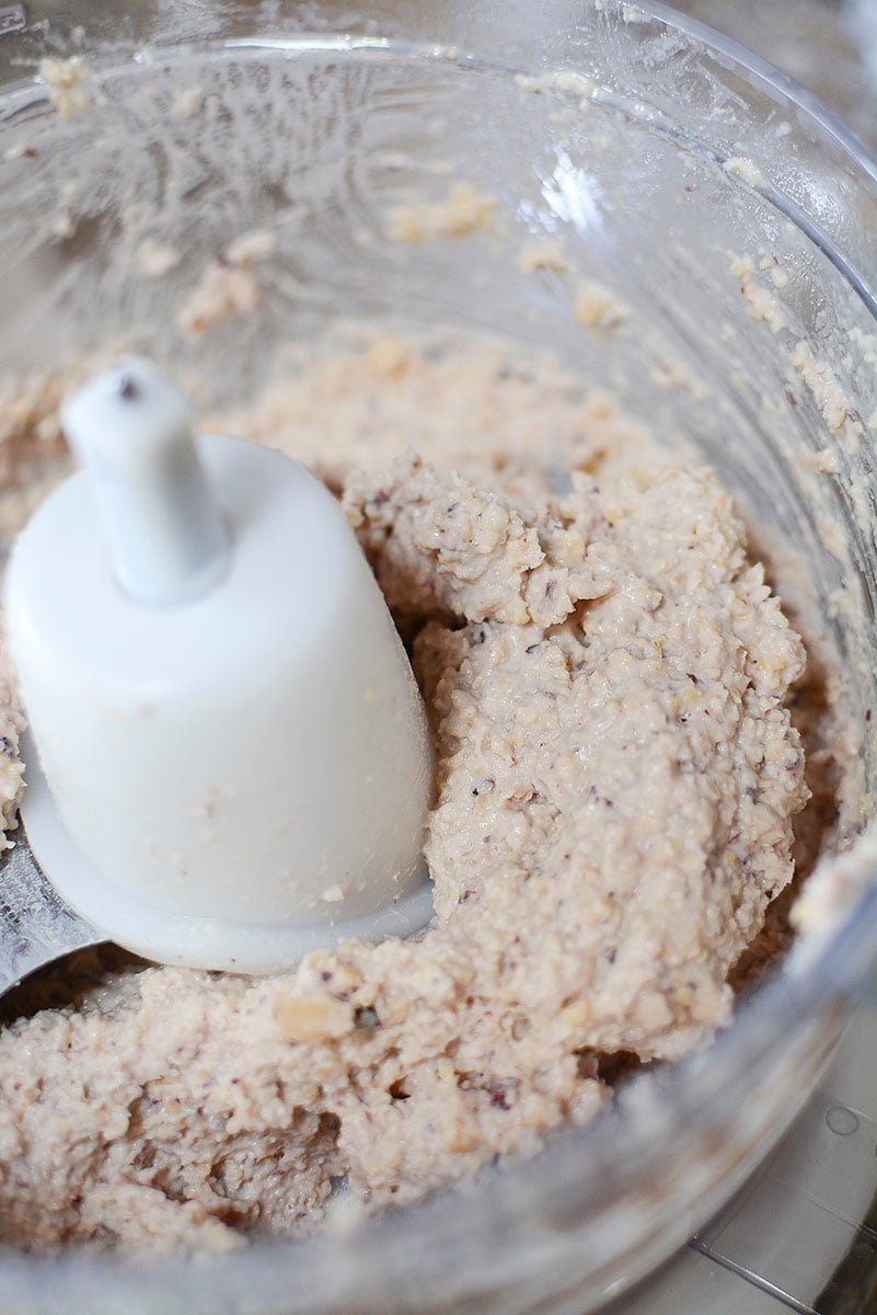 The olives and beans ground up in the food processor.