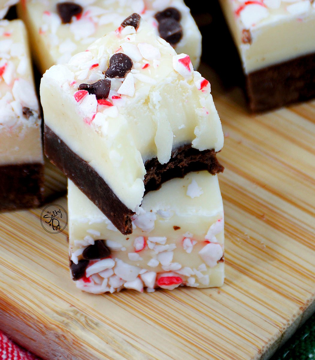 A super close up photo of a piece of fudge with a bite taken from it.