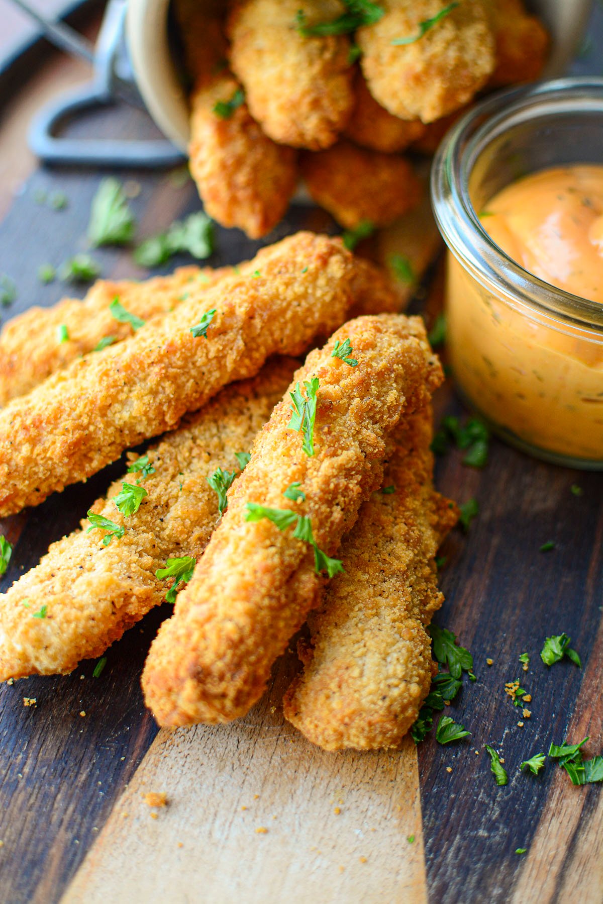 Cooked fries with parsley on top. 