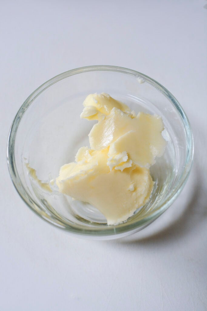 Butter in a glass bowl. 