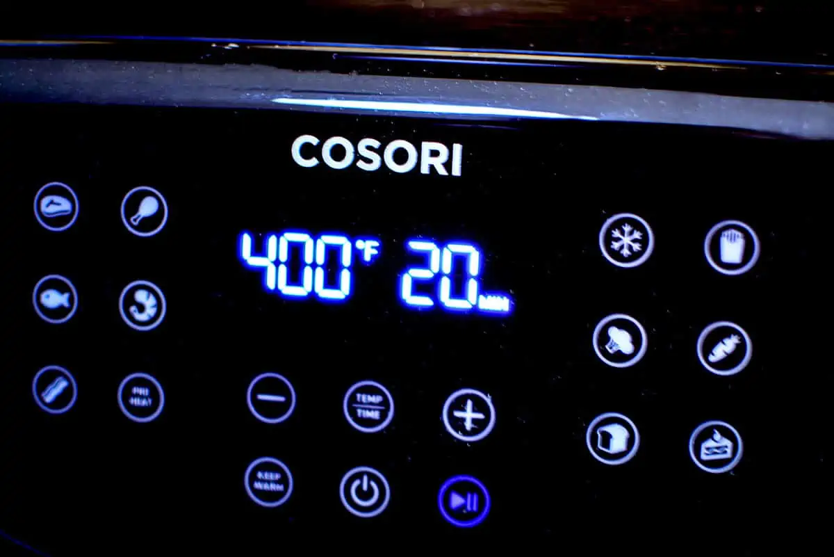 The LED screen of the cosori air fryer. 