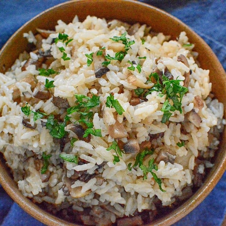 Mushroom rice with fresh parsley over the top.