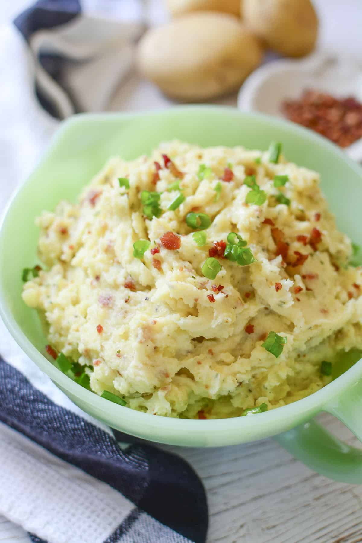 Boursin Mashed Potatoes in a green vintage bowl.