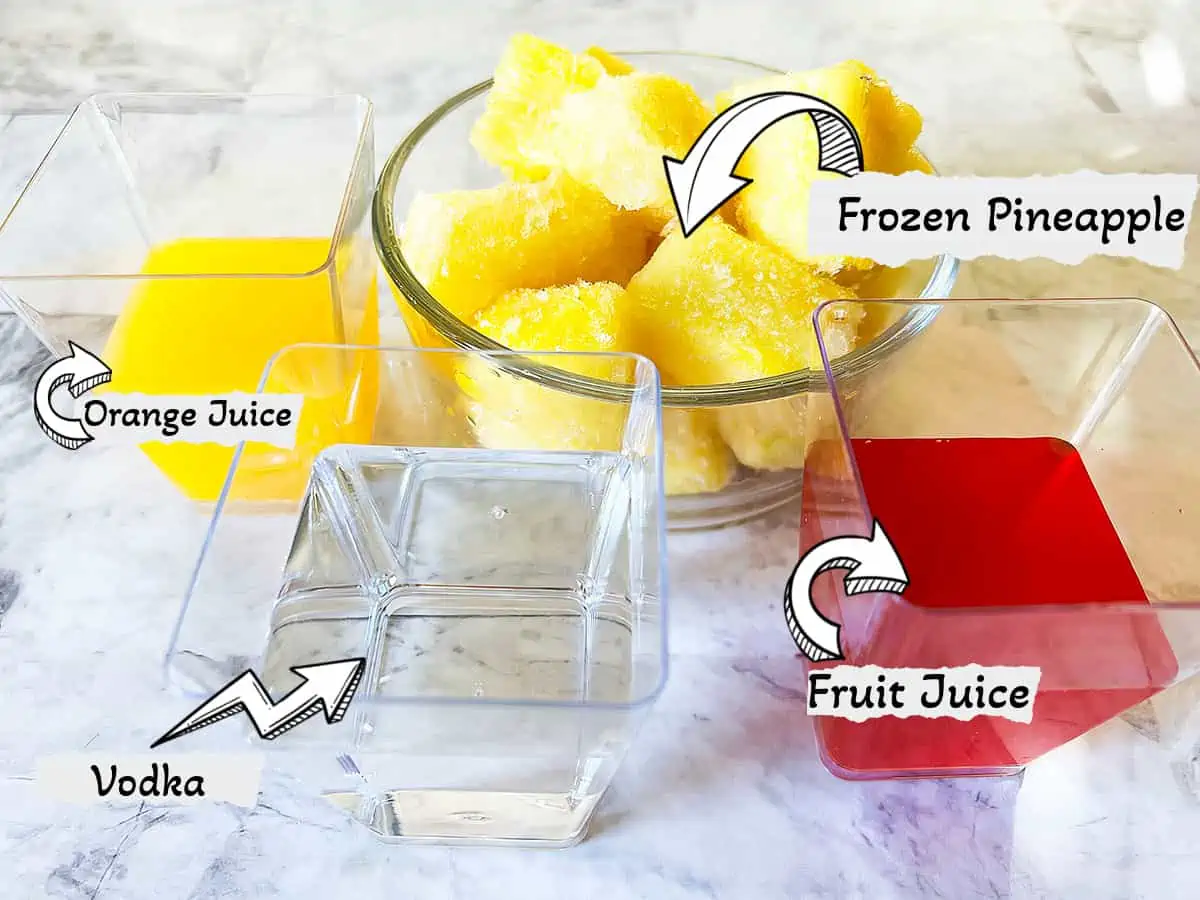 A labelled photo of the ingredients for the drink. Pineapple, fruit juice, vodka and orange juice.