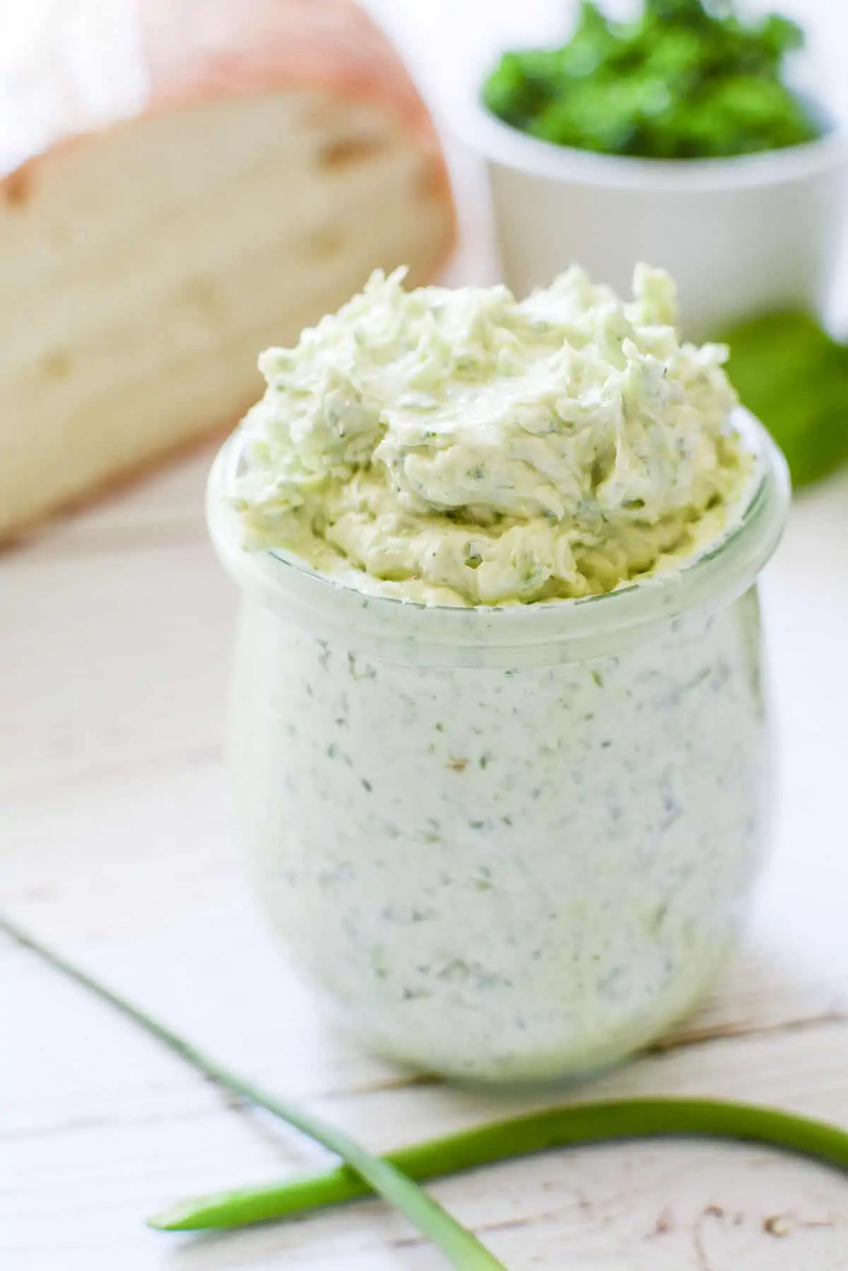 Whipped garlic butter in a glass jar. 