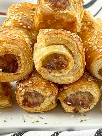 Air Fryer Sausage Rolls piled on eachother.