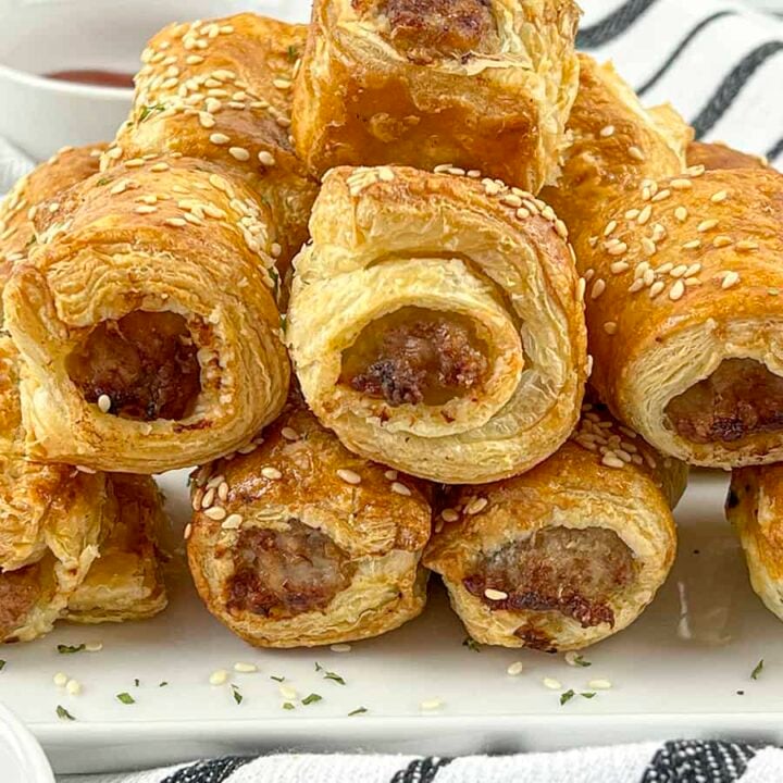 Air Fryer Sausage Rolls piled on eachother.
