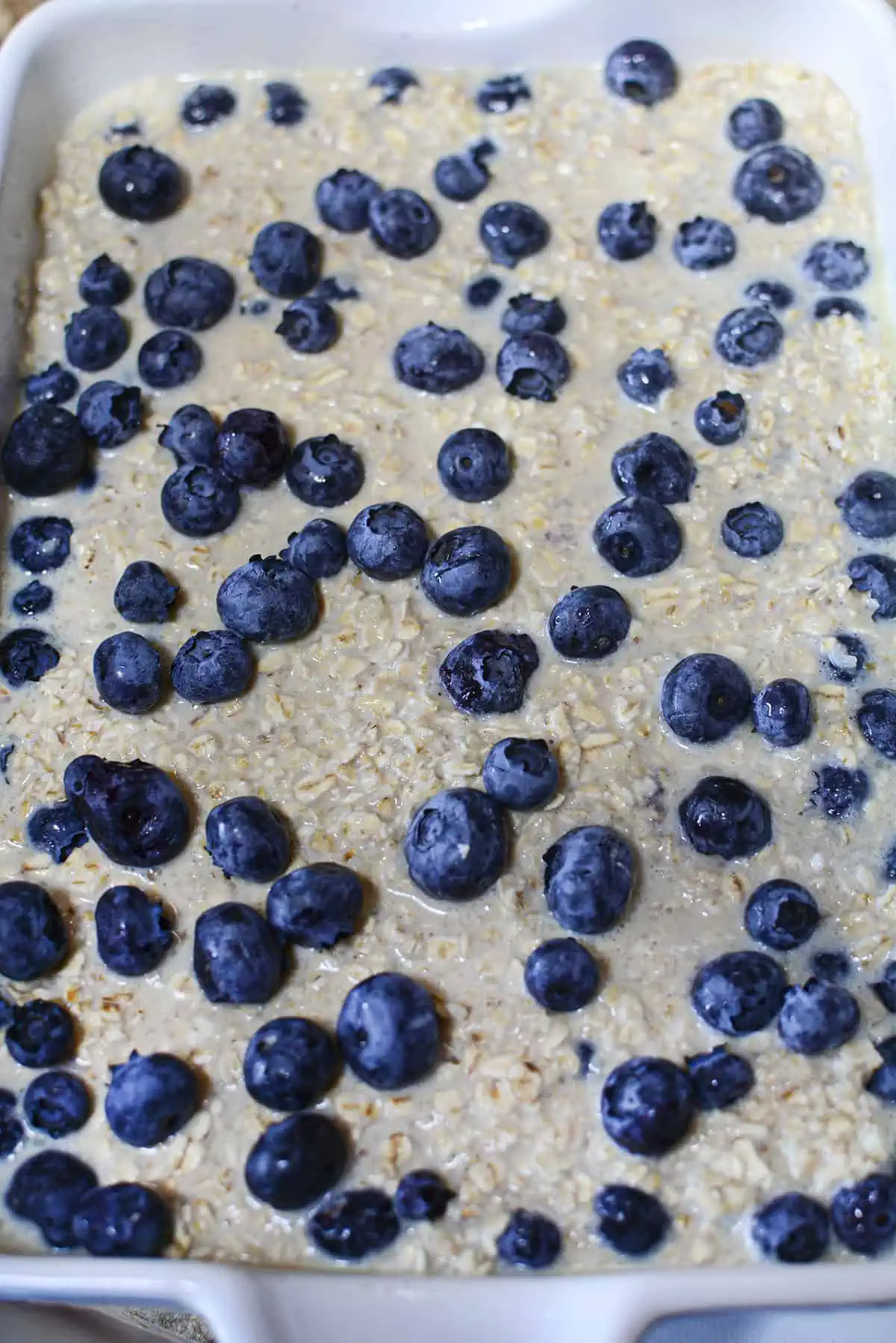 The remaining fresh blueberries sprinkled on top of the the oatmeal batter before baking.