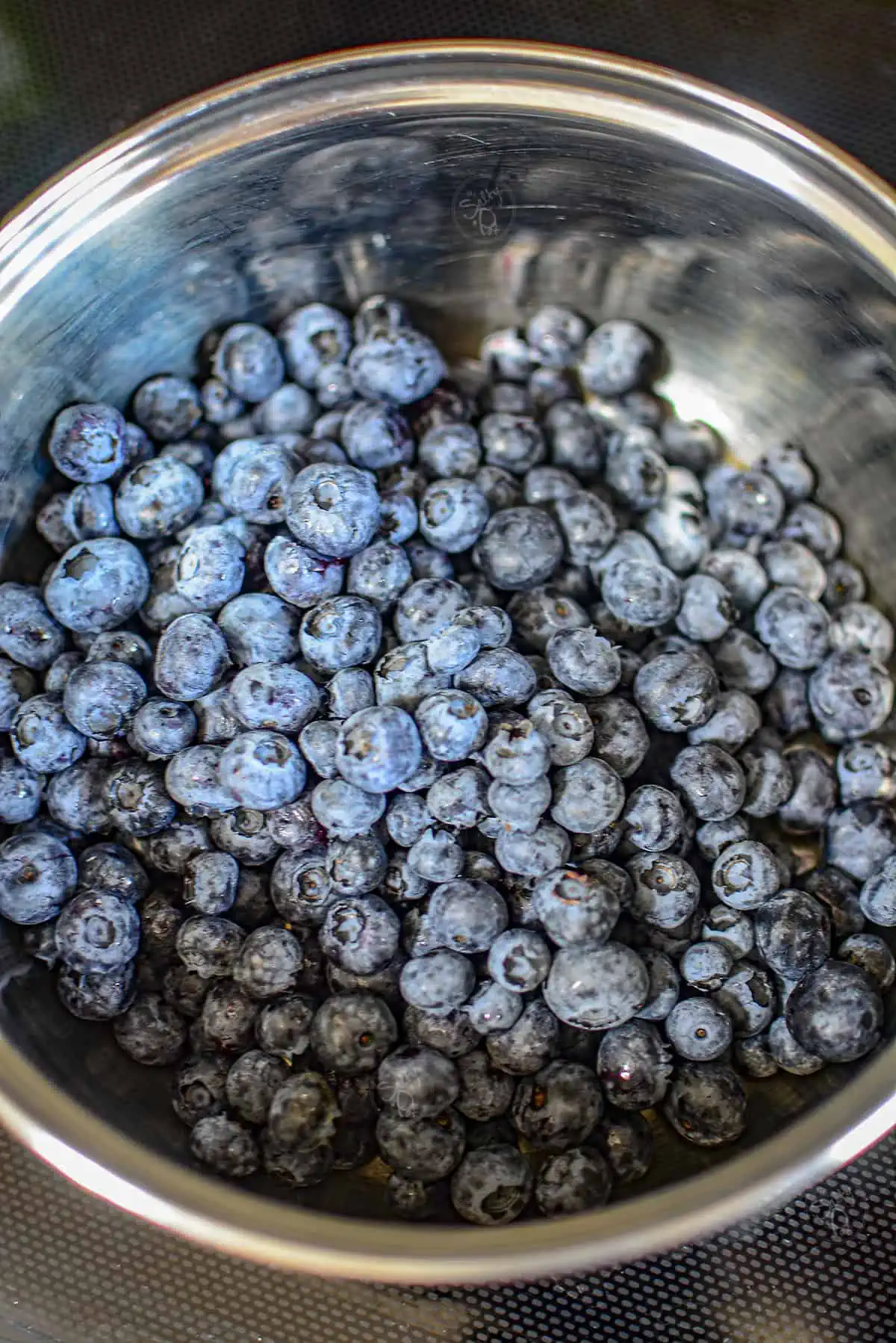 Fresh blueberries in a pot.