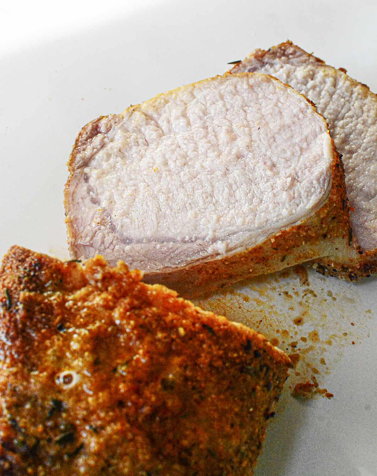 Deliciously juicy sliced roast pork.
