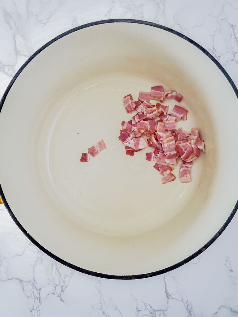 Bacon added to the pot.