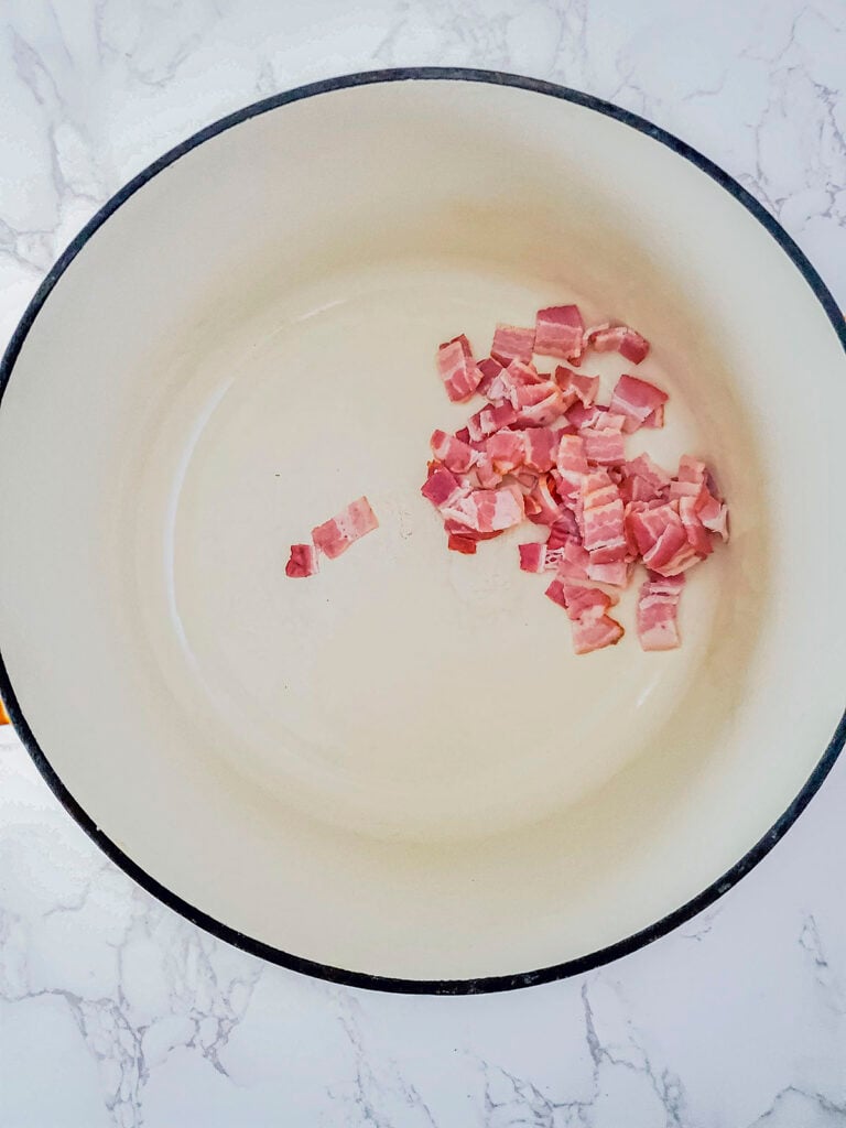 Bacon added to the pot.