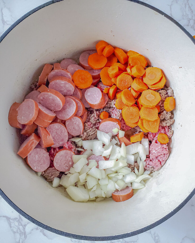 Sausage, carrots and other ingredients added to the beef. 