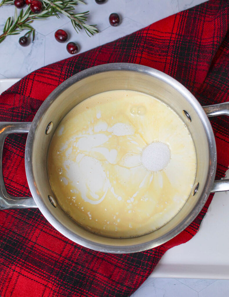 A pot with sugar added to the christmas custard.