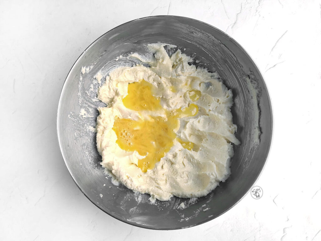 Egg yolk over the butter/sugar mixture.