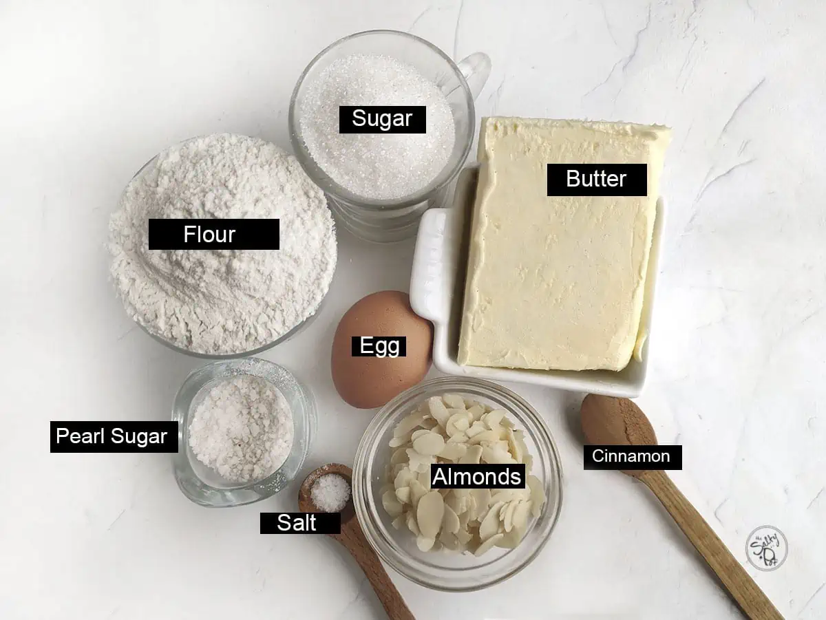 The ingredients needed for this dutch cookie recipe: Flour, sugar, butter, egg, cinnamon, almonds, salt and pearl sugar.