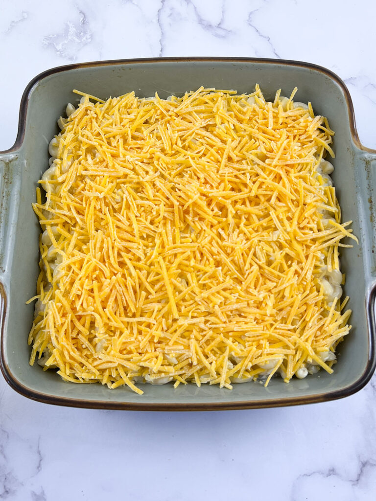Shredded cheese on top of the casserole.