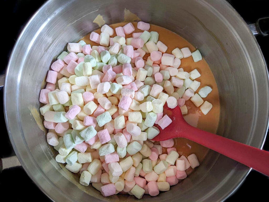 Mini fruity marshmallows added to the butterscotch mixture in the pot. 