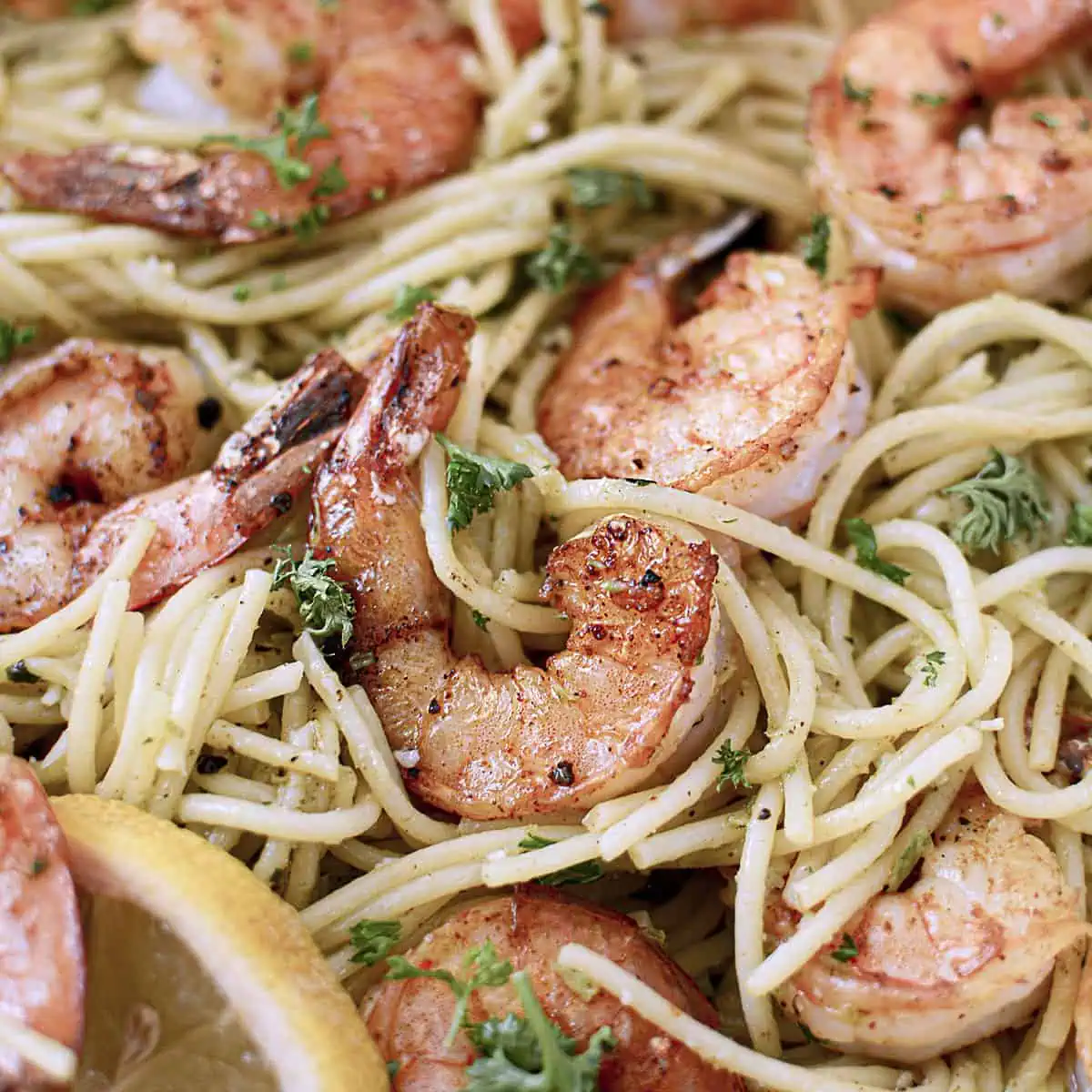 Garlic scape pesto pasta with shrimp square image.