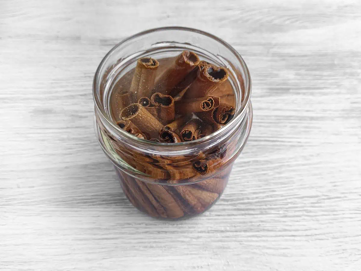 Cinnamon sticks in a jar filled with vodka. 