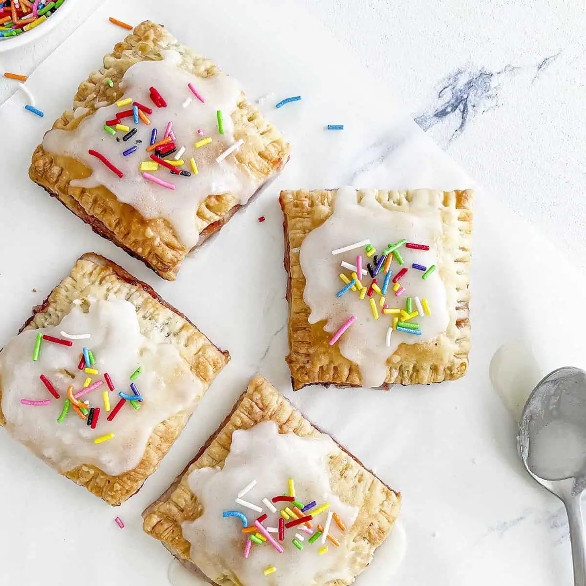 4 frosted strawberry pop tarts homemade.