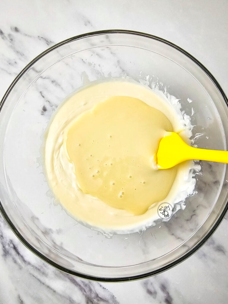 sweetened condensed milk and melted white chocolate chips.