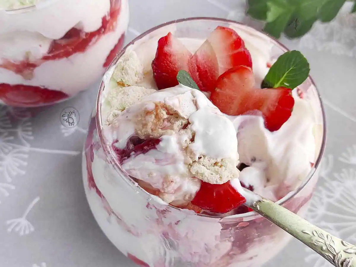 A top view of the parfait with a spoonful on top of the glass.