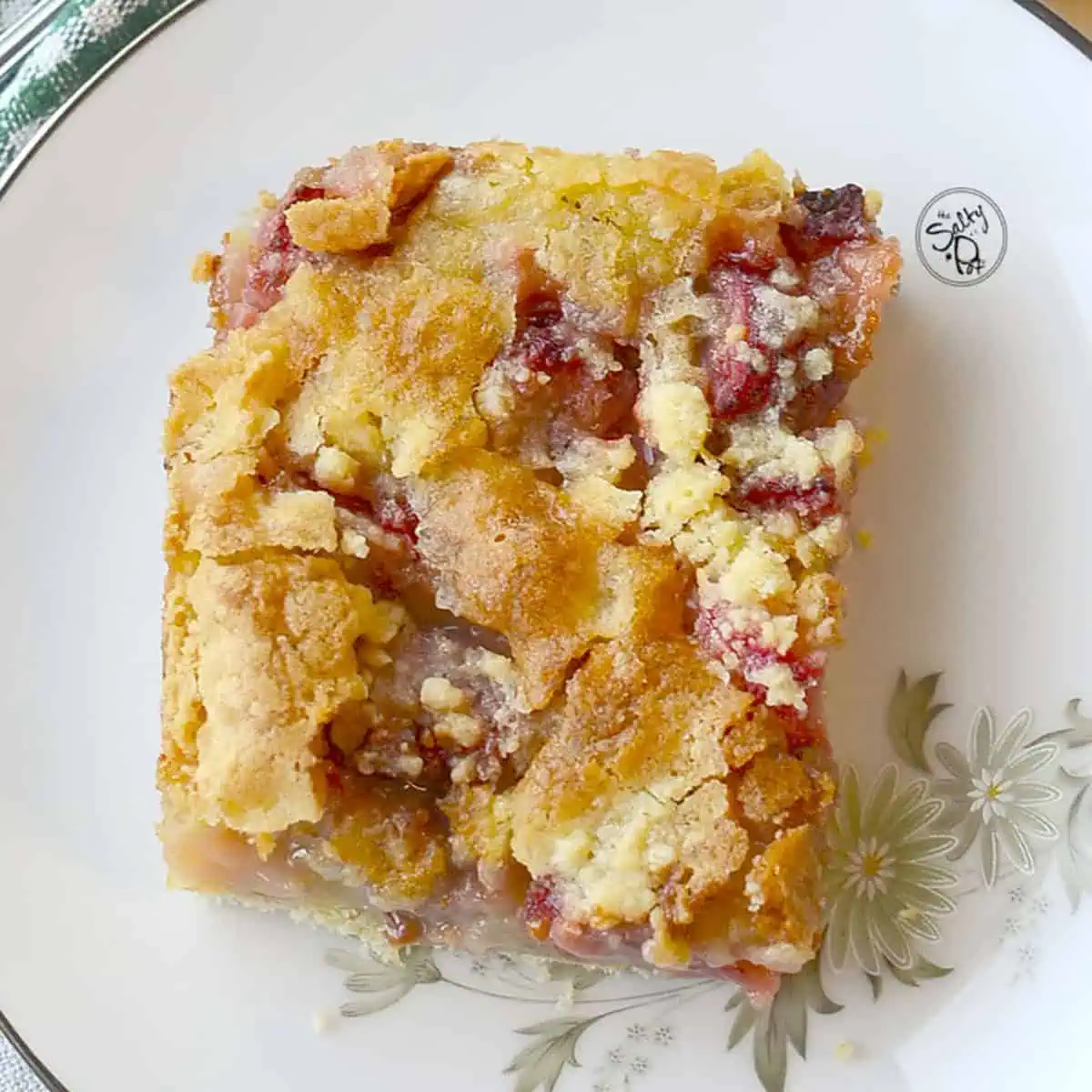 strawberry rhubarb crumb bars square image